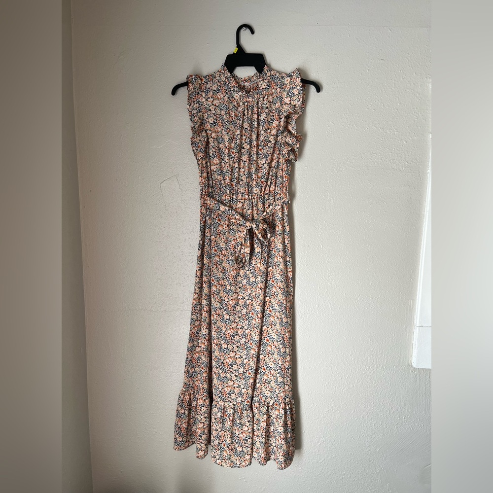 Floral maxi dress with keyhole back and waist belt.